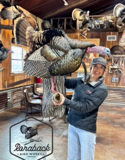 woman holding turkey mount